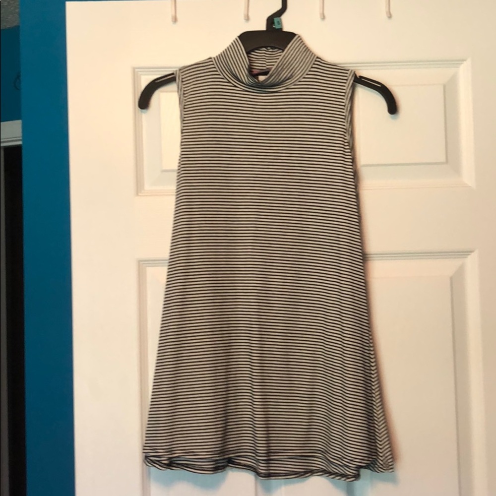 Large black and white turtleneck tank